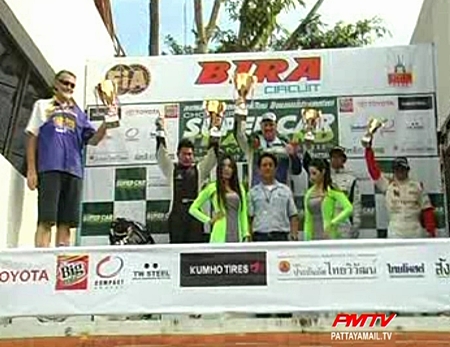 The winners of the third leg championship celebrate their victory.